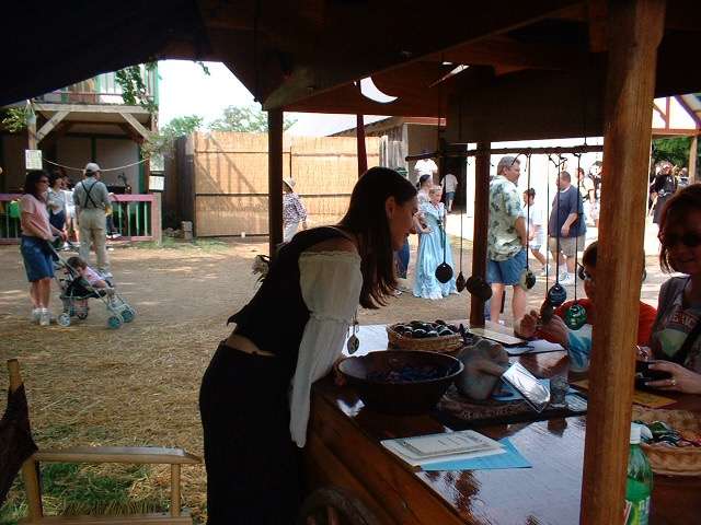 Cris Gale selling ocarinas to children.